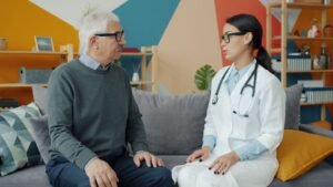 Senior man consulting a doctor about his health